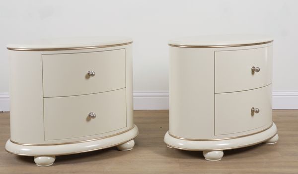 BRACKENBURY; A PAIR OF CREAM PAINTED OVAL BEDSIDE CHESTS (2)