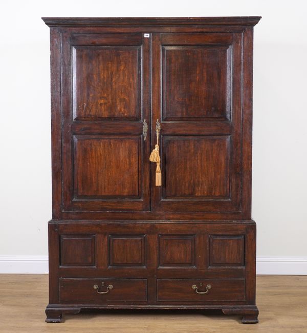 AN 18TH CENTURY OAK BAKING CUPBOARD