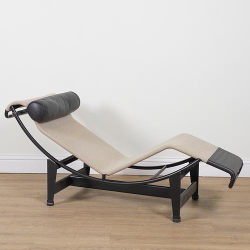 LE CORBUSIER; A CANVAS AND LEATHER CHAISE LONGUE