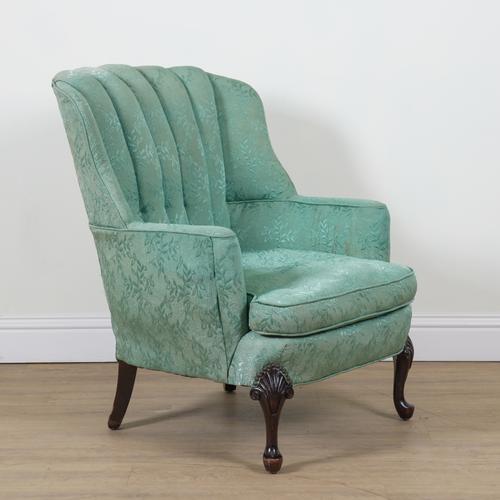 A GEORGE II STYLE SHELL BACK ARMCHAIR