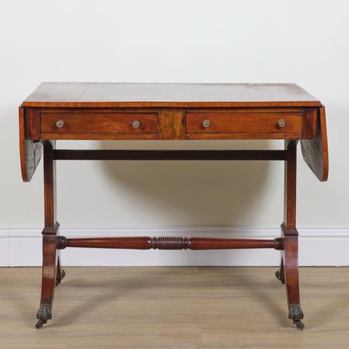 A REGENCY SATINWOOD BANDED MAHOGANY TWO DRAWER SOFA TABLE