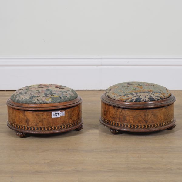 A PAIR OF VICTORIAN INLAID CIRCULAR  WALNUT LIFT TOP FOOTSTOOLS (2)