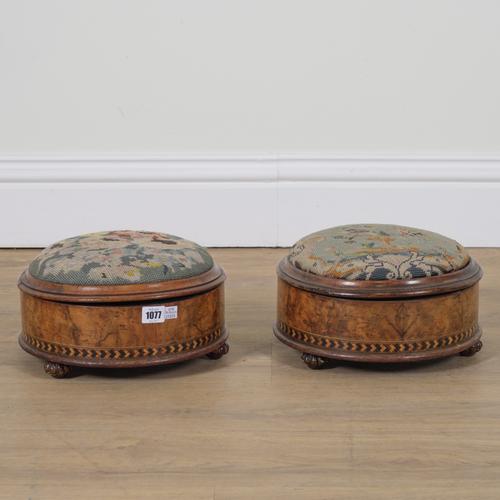 A PAIR OF VICTORIAN INLAID CIRCULAR  WALNUT LIFT TOP FOOTSTOOLS (2)