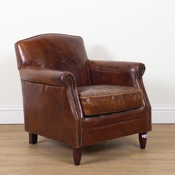A 1920S FRENCH CLUB STYLE TAN LEATHER UPHOLSTERED EASY ARMCHAIR