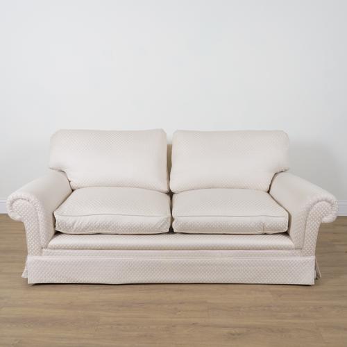 GEORGE SMITH; A CREAM AND LATTICE DECORATED UPHOLSTERED TWO SEAT SOFA