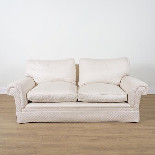 GEORGE SMITH; A CREAM AND LATTICE DECORATED UPHOLSTERED TWO SEAT SOFA