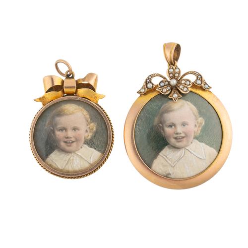TWO PENDANT OPENFACED LOCKETS (2)