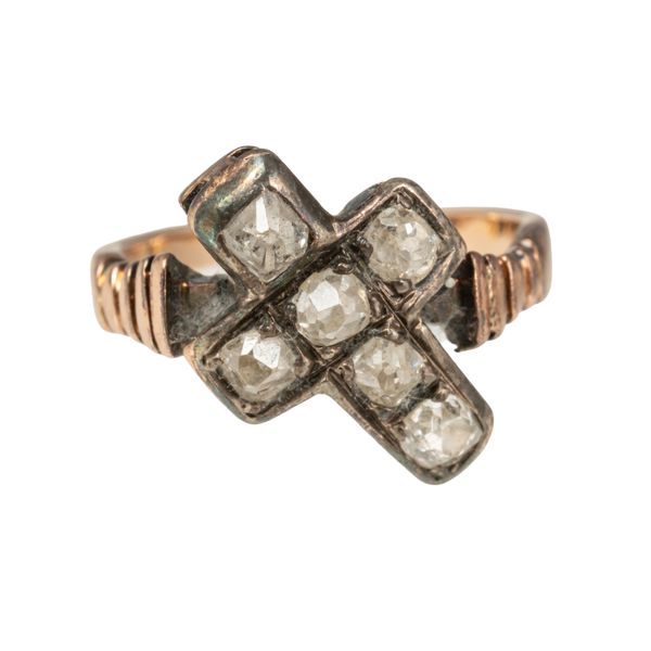 A GOLD AND SILVER SET DIAMOND CRUCIFORM RING