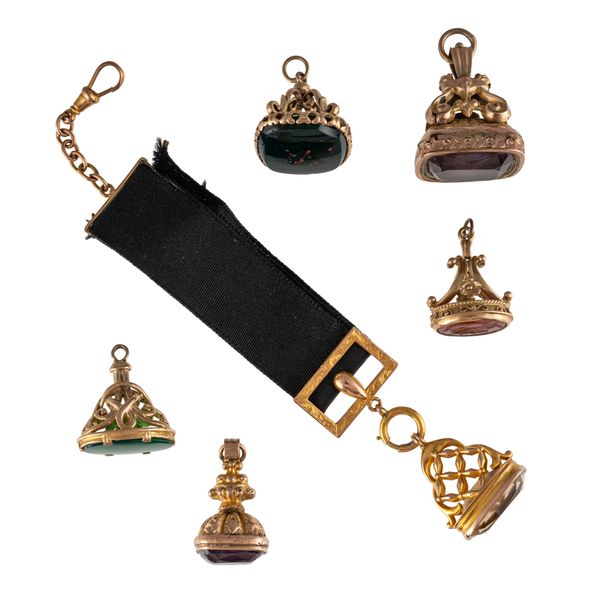 GROUP OF SIX SEALS AND PENDANT FOBS (6)