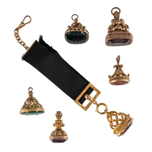 GROUP OF SIX SEALS AND PENDANT FOBS (6)