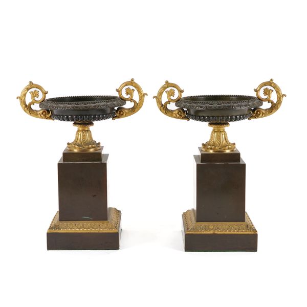 A PAIR OF FRENCH RESTAURATION STYLE GILT AND PATINATED BRONZE TAZZE (2)