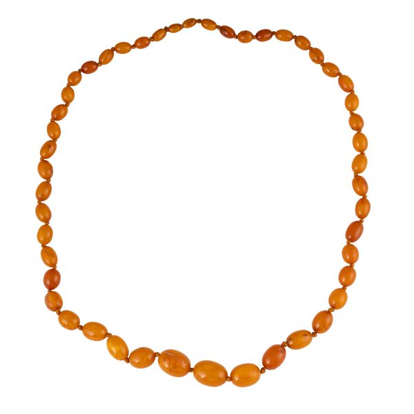 A STRING OF AMBER BEADS
