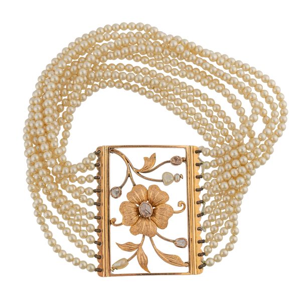 A GOLD AND ROSE DIAMOND RECTANGULAR CLASP FITTED WITH IMITATION PEARLS