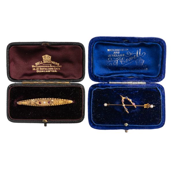 TWO GOLD AND GEM SET BAR BROOCHES (4)
