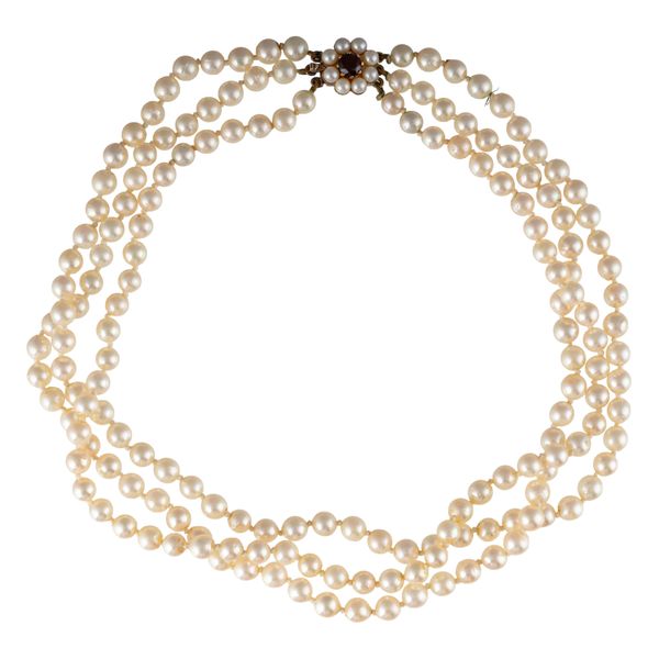 A THREE ROW CHOKER OF CULTURED PEARLS