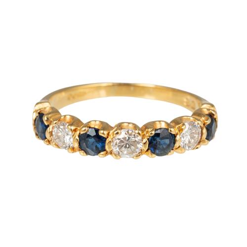 AN 18CT GOLD, SAPPHIRE AND DIAMOND SEVEN STONE HALF HOOP RING