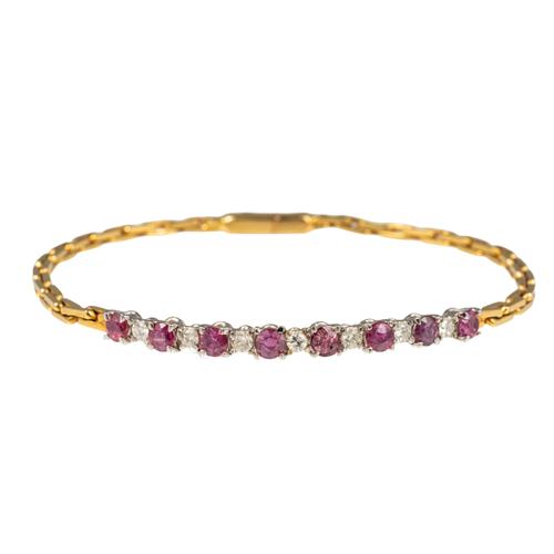 AN 18CT GOLD RUBY AND DIAMOND BRACELET