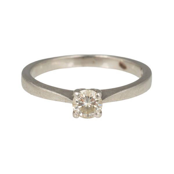 A PLATINUM AND DIAMOND SINGLE STONE RING