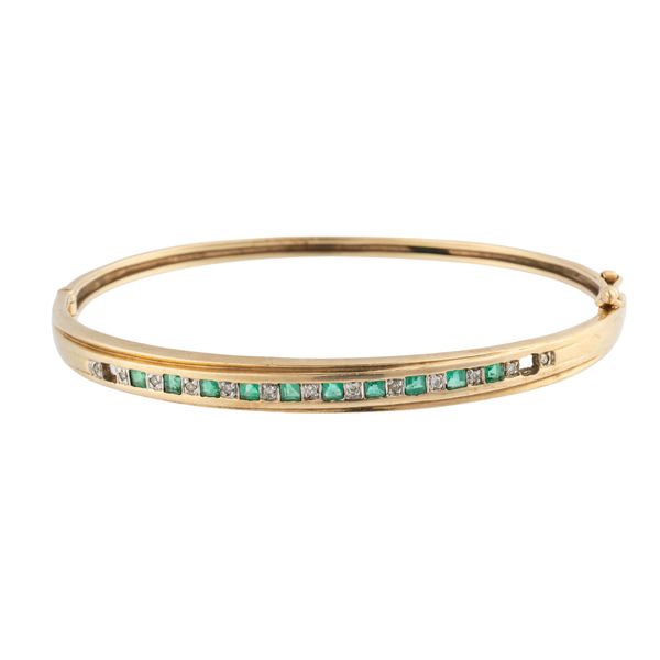 A EMERALD AND DIAMOND BANGLE
