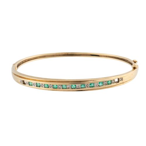 A EMERALD AND DIAMOND BANGLE