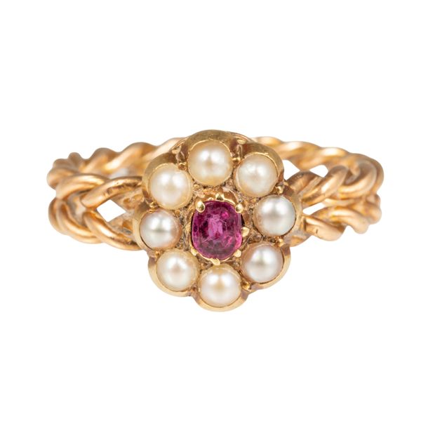 A GOLD, RUBY AND SEED PEARL RING