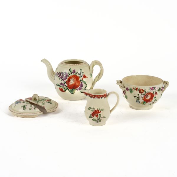 A CREAMWARE BULLET-SHAPED TEAPOT AND A SUGAR BOWL AND COVER (4)