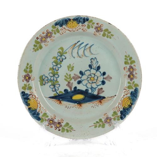 A LAMBETH DELFTWARE POLYCHROME PLATE