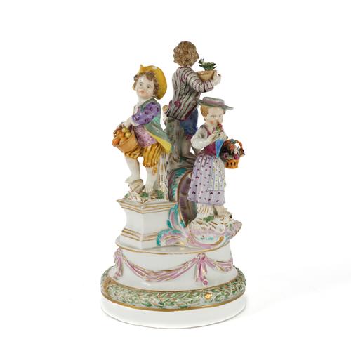 A MEISSEN GROUP OF FOUR CHILD GARDENERS