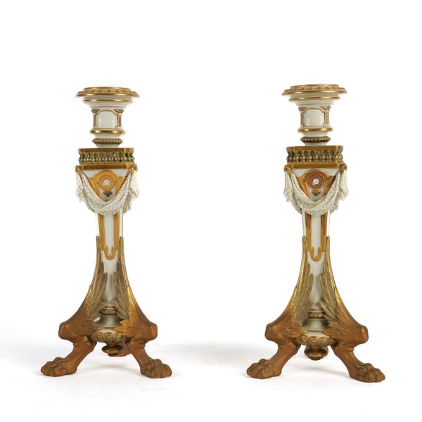 A PAIR OF ROYAL WORCESTER CANDLESTICKS (2)