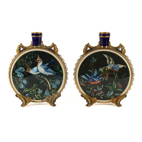 A PAIR OF ROYAL WORCESTER MOON FLASKS (2)