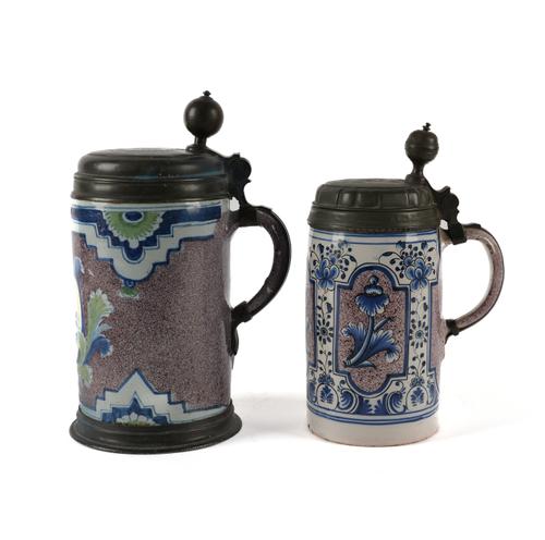 TWO GERMAN PEWTER-MOUNTED FAIENCE TANKARDS (2)