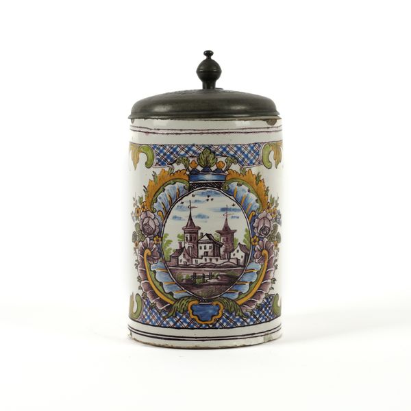 A PEWTER-MOUNTED FAIENCE TANKARD