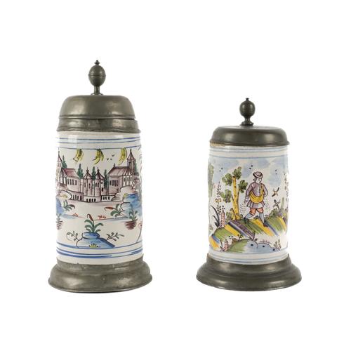 TWO THURINGIAN PEWTER-MOUNTED FAIENCE TANKARDS (2)