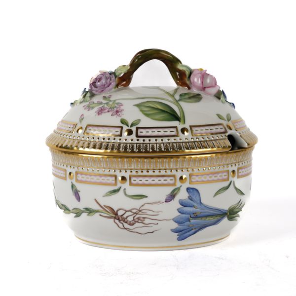 A ROYAL COPENHAGEN `FLORA DANICA' OVAL SUGAR BOWL AND COVER