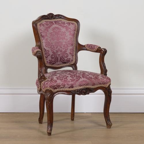 A VICTORIAN WALNUT FRAMED CHILD’S OPEN ARMCHAIR