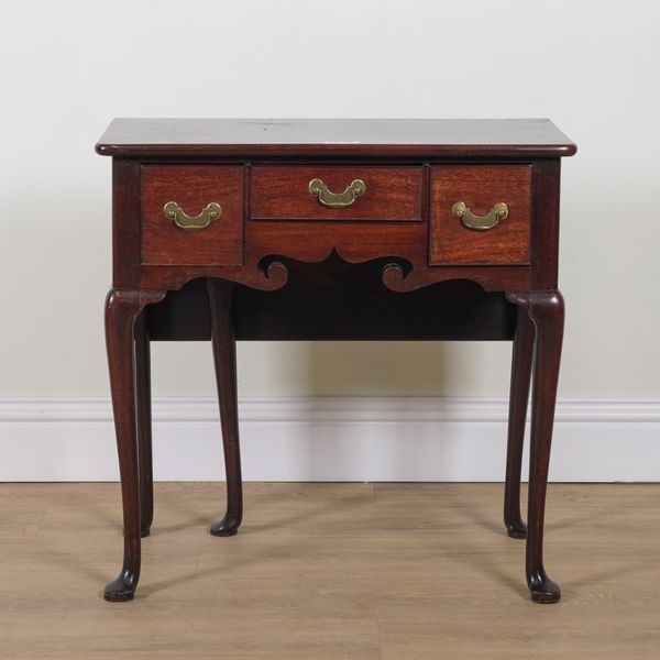 AN UNUSUAL GEORGE II MAHOGANY DROP FLAP LOW BOY