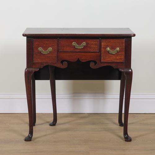 AN UNUSUAL GEORGE II MAHOGANY DROP FLAP LOW BOY