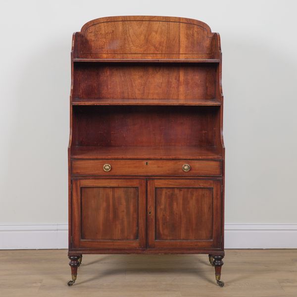 A REGENCY MAHOGANY WATERFALL BOOKCASE CABINET
