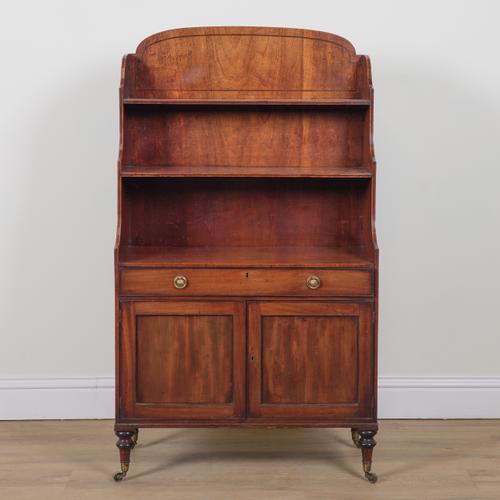 A REGENCY MAHOGANY WATERFALL BOOKCASE CABINET
