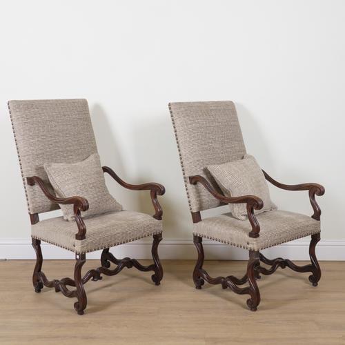 A PAIR OF 19TH CENTURY FRENCH CARVED MAHOGANY OPEN ARM HIGHBACK CHAIRS (2)