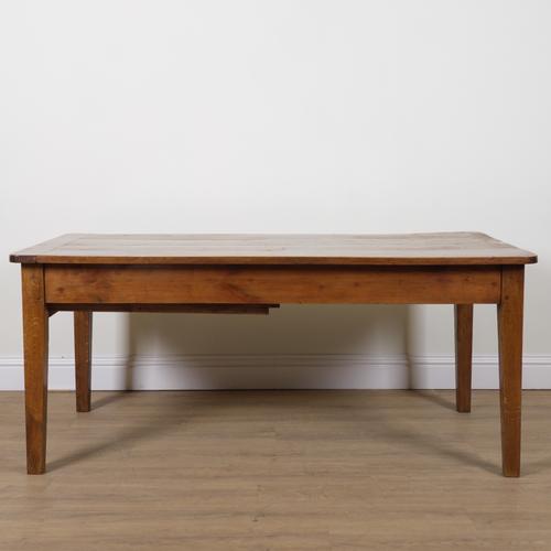 A 19TH CENTURY FRENCH FRUITWOOD KITCHEN TABLE