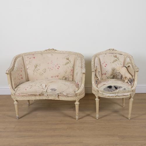 A LOUIS XVI STYLE WHITE PAINTED KIDNEY SHAPED SETEE (2)