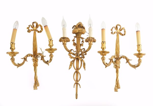 A PAIR OF GILT-METAL LOUIS XVI STYLE RIBBON TIED TWIN LIGHT WALL APPLIQUES (3)