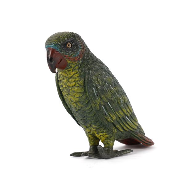 A COLD PAINTED LEAD GREEN AMAYAN PARROT