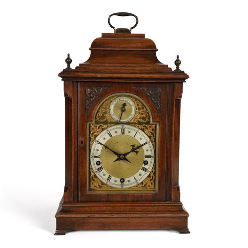 A WALNUT MANTEL OR BRACKET QUARTER STRIKING AND CHIMMING CLOCK