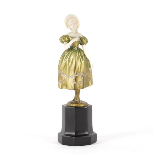 FERDINAND PREISS (1882-1943): A BRONZE AND IVORY FIGURE OF A GIRL IN A BONNET