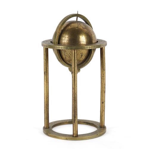 A BRASS CELESTIAL GLOBE ON STAND