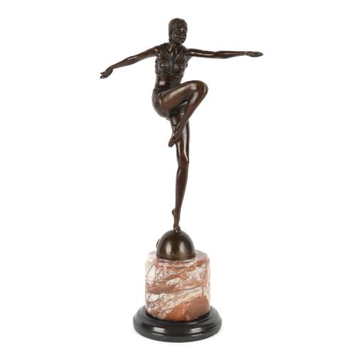 AN ART DECO STYLE BRONZE FIGURE OF A DANCER