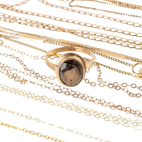 A SMOKY QUARTZ RING AND BROKEN CHAINS