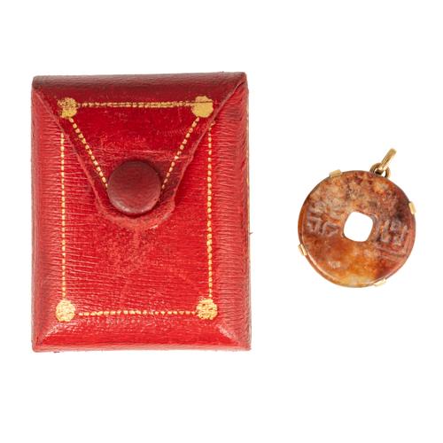 A GOLD MOUNTED BROWN HARDSTONE BI PENDANT (2)